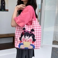 Pink checkered canvas tote bag with a cartoon girl print for students and commuting - Toast Girl