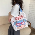 White canvas tote bag featuring blue handles and a cute cartoon girl with boom text - Bun Girl