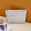 Quilted light blue makeup bag with cute rabbit print and secure zipper closure - Pink Blue Fairytale Rabbit