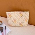 Quilted floral makeup bag with cute rabbit print and secure metal zipper closure - Bouquet Rabbit