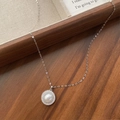 Elegant S925 sterling silver necklace with a round pearl and sparkling zircon pendant - 925 Silver / White Gold