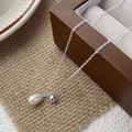 Elegant S925 sterling silver necklace with freshwater pearl pendant on a wooden display - 925 Silver / Silver