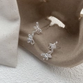 Élégantes boucles d'oreilles double nœud en argent sterling S925 au fini poli - Argent (C527) / Argent 925