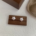 Minimalist matte S925 sterling silver star stud earrings displayed on a small wood block - 925 Silver / Silver (C257)