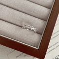 Minimalist S925 sterling silver ring featuring a continuous delicate bow design in silver - Adjustable Open / Multiple Bow Style (D616)