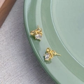 Eleganti orecchini a lobo a fiocco in argento S925 con zircone e finitura dorata - Oro