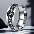 Close-up of 8mm wide stainless steel ring with black engraved tribal cross pattern - Size 7 / Silver Style (1-B-4)