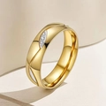 Close-up detail of a gold stainless steel ring featuring a wave design and small crystals - US 12 / Women's Gold Wave With Rhinestones (1-A-3)