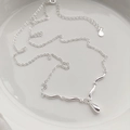 Minimalist S925 sterling silver necklace with teardrop pendant on white ceramic background - 925 Silver / Silver
