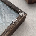 Eleganti orecchini a lobo a fiocco in argento sterling S999 con finitura lucida a specchio - Argento 990 / Argento