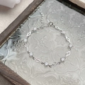Elegante pulsera de plata de ley S925 con circonitas cúbicas y diseño de rombo - Plata 925 / Oro Blanco