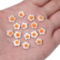 Macro detail of fried egg flower beads with side holes for DIY jewelry making - 8mm Double-sided (5 Pieces/Pack)
