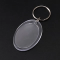Oval clear acrylic blank photo frame keychain with silver metal ring for DIY projects - Ellipse