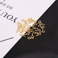 Golden 9mm screw eye pins for DIY jewelry making displayed on a contrast background - Gold