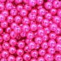 Macro shot of bright pink ABS acrylic pearl beads with threading holes for DIY jewelry making - Light Rose