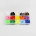 Detailed overhead shot of 15 colors plastic snap fasteners set in clear storage box - 15 Grids Boxed