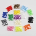 Assorted colorful resin snap buttons in transparent pouches for DIY clothing projects - 15-Color Set
