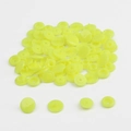 Detail of neon yellow plastic snap buttons showing four component parts for DIY sewing - Neon Yellow