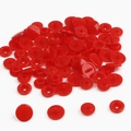 Detail view showing four components of a bright red plastic resin snap fastener - Red