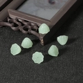 DIY jewelry parts featuring light green lotus and seed pod shaped glass beads - 10mm x 7mm / Light Green