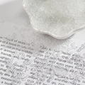 Macro shot of 2-4mm clear glass seed beads for DIY jewelry making in a white ceramic dish - 2mm / White