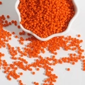 Macro shot of 2-3mm orange glass beads in a white ceramic bowl for DIY jewelry making - 3mm (15g/Pack, Approx. 500pcs) / Orange Red