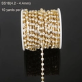 Catena di strass SS18 base dorata con cristalli bianchi per decorazioni DIY - SS18 (4.2-4.4mm) / Oro Zirconia Trasparente