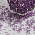 Pastel purple cylindrical glass beads for DIY jewelry making in a decorative ceramic bowl - 2mm (15g/Pack) / Violet