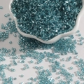 Light blue glass tube beads for DIY crafts displayed in a white floral ceramic bowl - 2mm (15g/Pack) / Lake Blue
