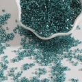 Peacock blue glass seed beads in a white ceramic bowl for DIY jewelry and hairpins - 2mm (15g/Pack) / Peacock Blue