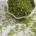 Grass green cylindrical glass tube beads for DIY embroidery in a white ceramic bowl - 2mm (15g/Pack) / Olive Green