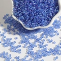 Vibrant translucent blue rainbow glass seed beads for DIY jewelry and bracelet making - Blue AB