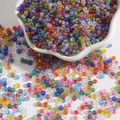 Colorful mixed glass seed beads for DIY jewelry and embroidery crafts in a white bowl - Random Mix AB