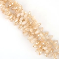 Faceted olive-shaped champagne crystal beads for DIY jewelry and earring making - 6x12mm (50 Pieces/Pack) / White Jade Half Amber