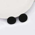 Pair of black round non-woven felt pads for DIY hair accessories and bow making - 25mm / Black