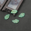 Translucent emerald green leaf charms with gold foil for DIY jewelry making - Green Gold Powder
