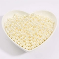 Creamy white round faux pearls in a heart ceramic dish for DIY jewelry making - 半孔(14mm) / 500g/Pack (Approx. 340 Pcs) / Beige
