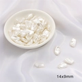 Macro detail of 14x9mm irregular baroque ABS pearls for DIY jewelry making - Wave Shape