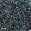 Detailed macro view of colorful iridescent glass bugle beads for DIY jewelry making - 2x6mm (10g/Pack) / Black Multi-color