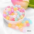 Close-up of 10mm pastel acrylic round beads with frosted texture for DIY jewelry crafts - Round Beads / 10mm (Approx. 65 Pieces/Pack) / Jelly Iridescent
