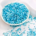 Macro shot of assorted blue glass seed beads with matte and transparent textures for DIY craft - 3mm (30g/Pack Approx 1000 Pieces) / Blue Series