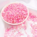 Macro shot of assorted 3mm pink glass seed beads scattered on white silk fabric - 3mm (30g/Pack Approx 1000 Pieces) / Pink Series