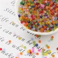 Colorful frosted seed beads in a white bowl for DIY jewelry making and handmade crafts - 3mm 20g/Pack Approx 700 Pcs / Mixed Colors