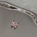 Elegant S925 sterling silver necklace with pink opal butterfly pendant on a silver tray - 925 Silver / White Gold