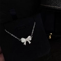 Elegante collana a fiocco in argento sterling S925 con ali in pietra occhio di gatto - Argento 925 / Oro Bianco
