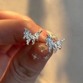 Delicate S925 sterling silver butterfly stud earrings with sparkling pave zircon stones - 925 Silver / Silver