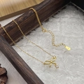 Elegante collana con fiocco in argento S925 placcato oro e zircone cubico rotondo lucido - Argento 925 / Oro