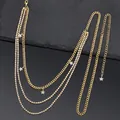 Detail of multi-layer gold waist chain with rhinestone star pendants and lobster clasp - Galaxy Waist Chain / Gold