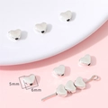 Silberne Herz-Metallperlen für DIY-Schmuck mit Abmessungen von 6mm x 5mm - Herz