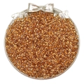 Close-up of amber gold glass seed beads in a tray with a silver bow for DIY jewelry - 2mm / Champagne Gold